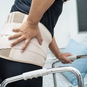 Patient in physiotherapy during hip replacement surgery recovery